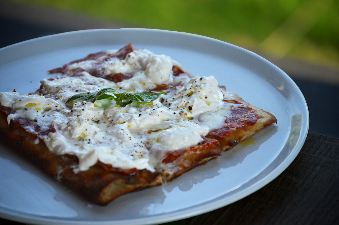 a pizza with cheese and toppings