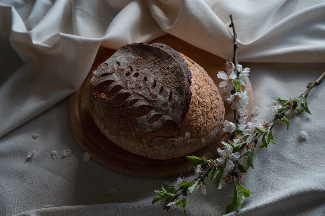 A loaf of bread sitting on top of a white cloth