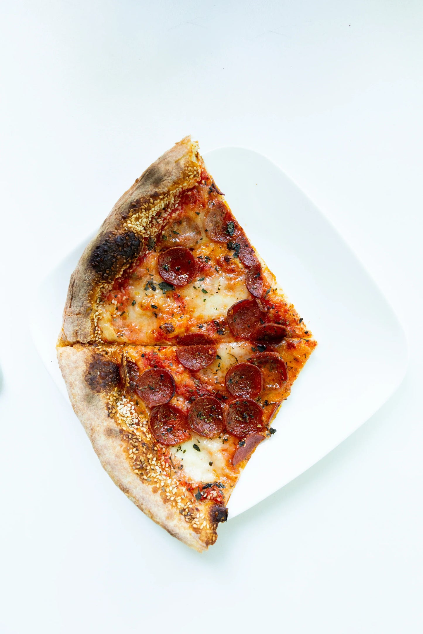 delicious-plate-of-pepperoni-pizza - DoughRise.Store