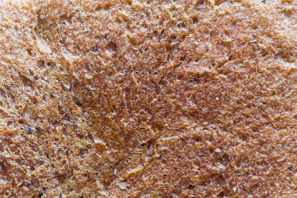 An open, aerated sourdough crumb, evenly risen with a light structure